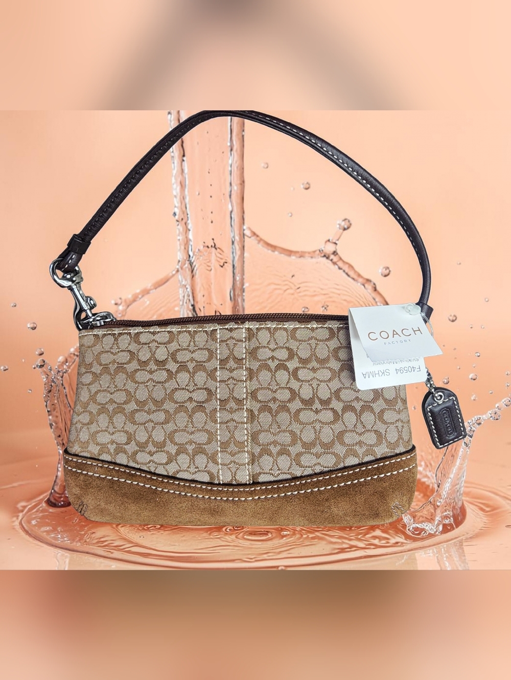 Coach Signature Mini Duffel Wristlet(Style #F40594) in the Khaki/Mahogany NWT